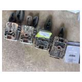 Four browning trail cameras