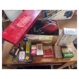 Gun cleaning kit and assorted ammunition