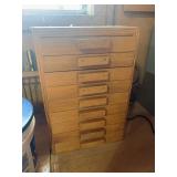 Homemade wooden box full of miscellaneous tools, drill bits, knives, Allen wrenches, small hand tools, files