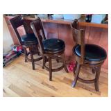 Three swivel 24 inch seat barstools