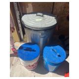 Galvanized trashcan, and two buckets with lids