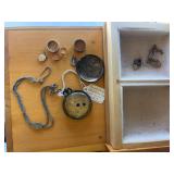 Treasure hunting pocket watch find, 18 karat white gold band, two gold baby rings, sterling ring band, etc.