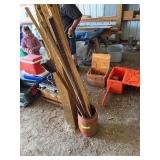 Nail keg with lots of homemade walking sticks