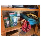Sleeping pad, fishing vest, two lanterns, air bed, and pump