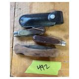 Three folding knives