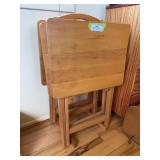 Four wood TV trays