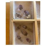 Two drawer cubbies full of quartz crystals