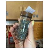 Glass canister full of large Montana Sapphire’s