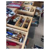 Four shop drawers includes chisels, tape measures, miscellaneous tools, sandpaper