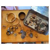Metal detector finds, including lots of rings and pins, some sterling, some gold, some cannot be read