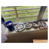 Rocks and shells galore! on window sill