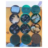 Six canisters of gemstones