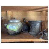 Cast-iron smelting pot, old coffee pot, and old tools