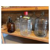 Carboys and jugs and wine making items