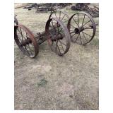 Four metal wheels with some parts-bring help to load