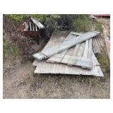 Wood, old wheel barrow, wire roll