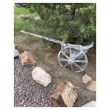 Miners cart-it rolls but heavy, bring help to load