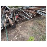 Metal, metal posts, bent t posts, approximately 10 railroad ties-bring help to load