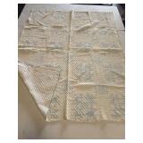 Vintage quilt features a delicate blue patterned design and a intricate diamond quilting pattern75x60