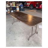 Folding table and trash cans
