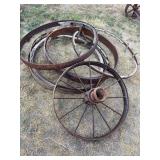 One metal wheel, wood wagon wheel parts