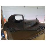Rustic handcrafted metal model car