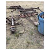 Wagon parts, old post hole digger