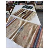 Three southwestern rugs and runners