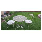 White 28” round iron table with two chairs