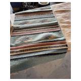 Two southwestern rugs, wall hanger