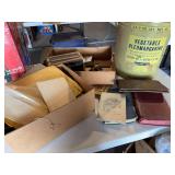 Old photos, books, tin can