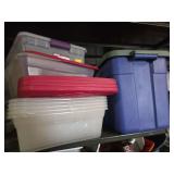 Storage totes located on two shelves