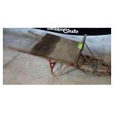 Steel wheeled wheel barrow