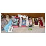 Porcelain dolls and a very scary composition doll w sleep eyes