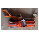 Black and Decker battery operated hedge trimmer and Worx weed eater, both have batteries and chargers