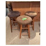 Two stationary matching bar stools and the mismatched third wheel 24” seat height