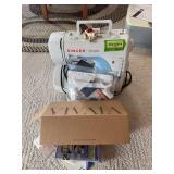 Singer Simple sewing machine and notions