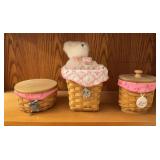 Three Longaberger breast cancer baskets
