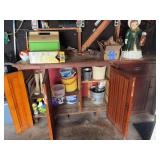 All in and on lower cupboard in garage