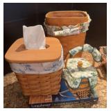 Three Longaberger baskets and Longaberger book