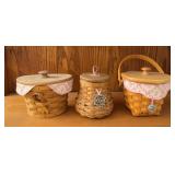 Three Longaberger breast cancer baskets