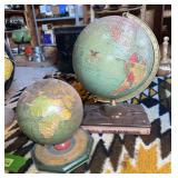 Two globes-10” Replogle reference globe w book and smaller tin globe w seasons, months, zodiac