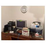 On top of desk incudes Memorex power center, Emerson monitor, speakers, office supplies, etc