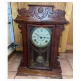 Seth Thomas eight day half hour strike kitchen clock w key