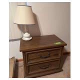 Two drawer night stand and hobnail milk glass bedside lamp