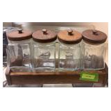 Set of glass canister jars w wood rack