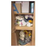 Easter and Halloween decor as shown in cabinets C