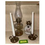 Two oil lamps and brass? candle holders