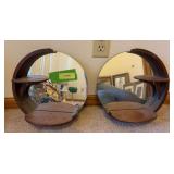 Two mirrored back round wall shelves approx 12" tall