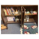 Books, vases, and coasters in book case